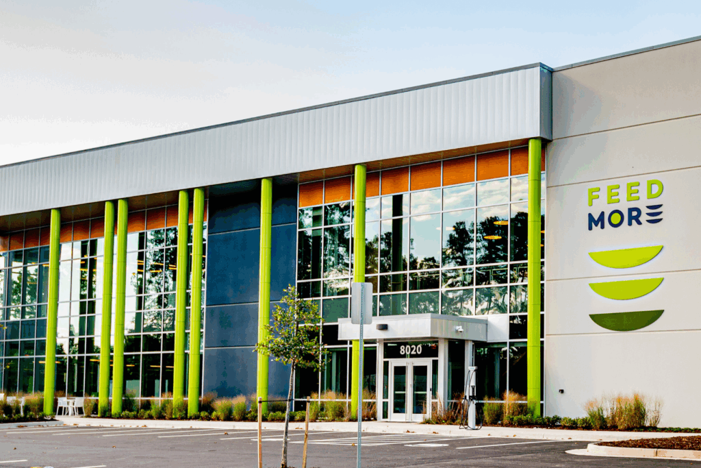 Banner image for Feed More Charity Navigator Four Star rating. Photo of Feed More's headquarters at 8020 Villa Park Drive in Richmond, VA.
