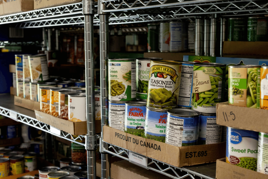 Thanksgiving food insecurity help Central Virginia canned food on shelf in Feed More partner food pantry